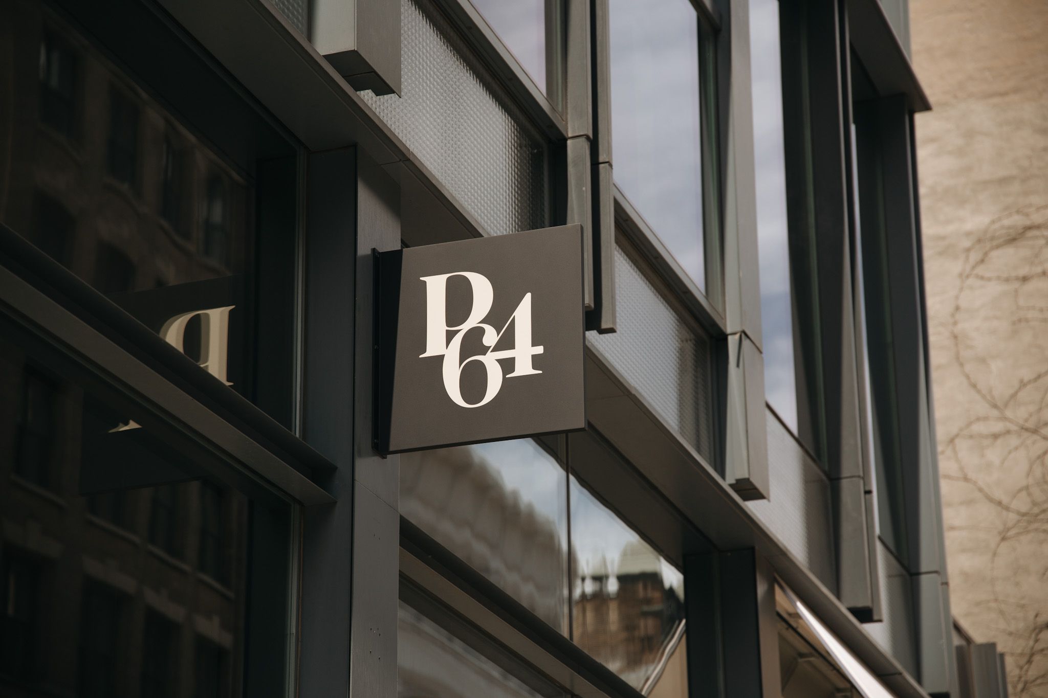 PARIS/64 sign outside its boutique in New York's SoHo neighborhood