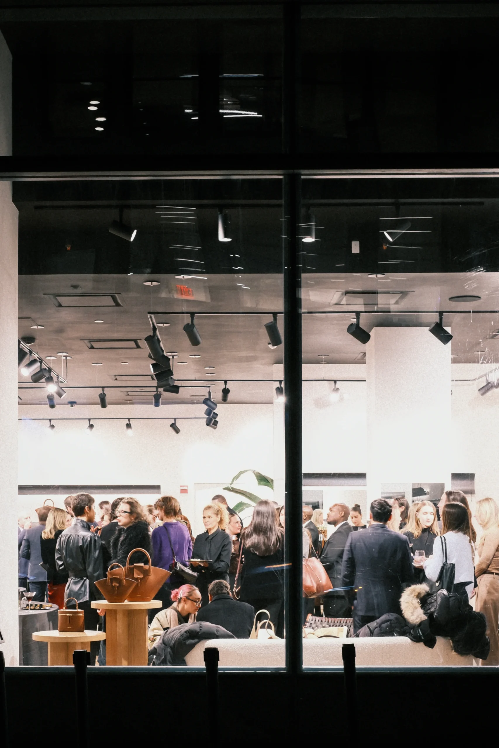 Guests gathered inside the PARIS/64 boutique at 465 Broadway in SoHo