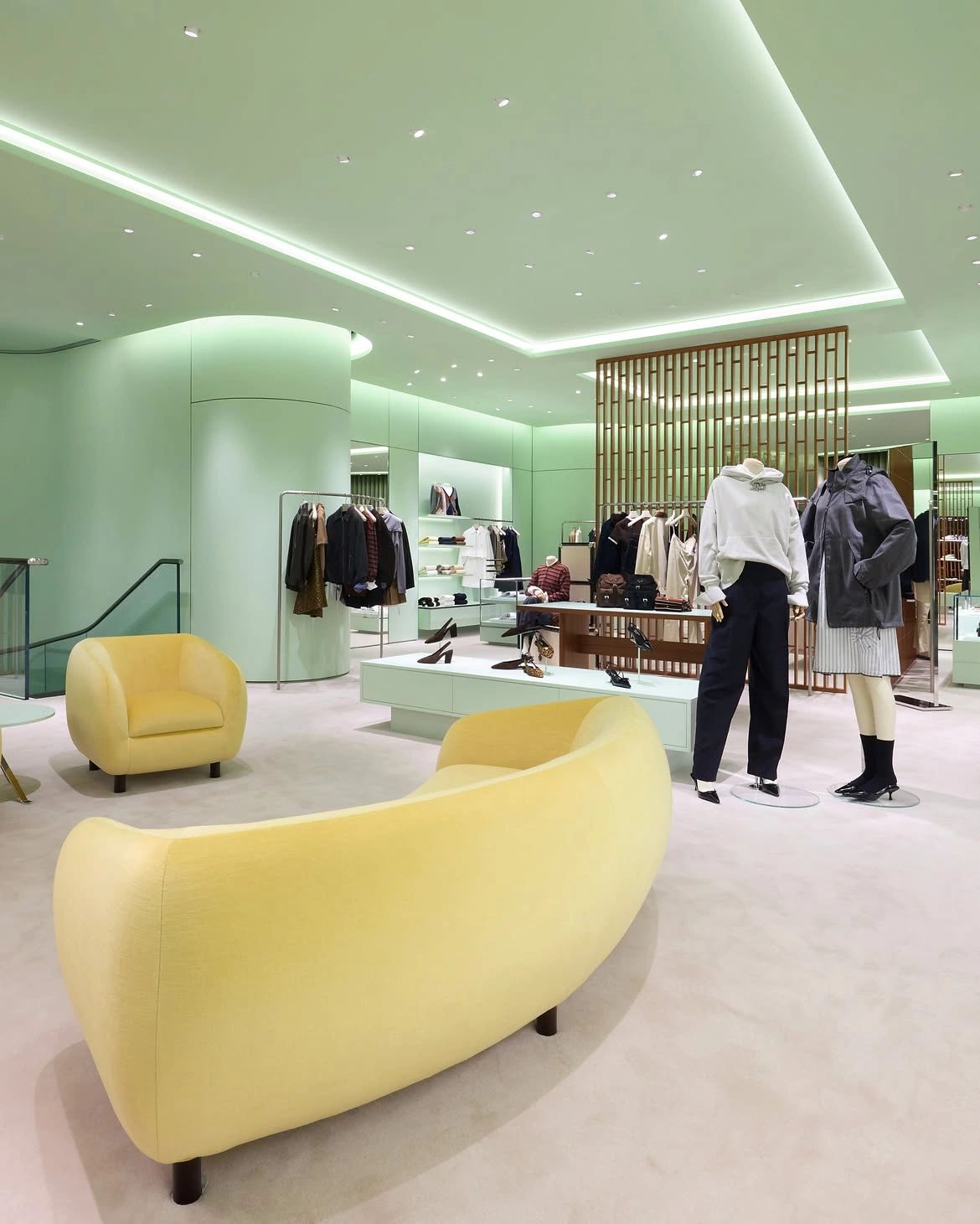 Seating and clothing displays in Prada's K11 MUSEA boutique