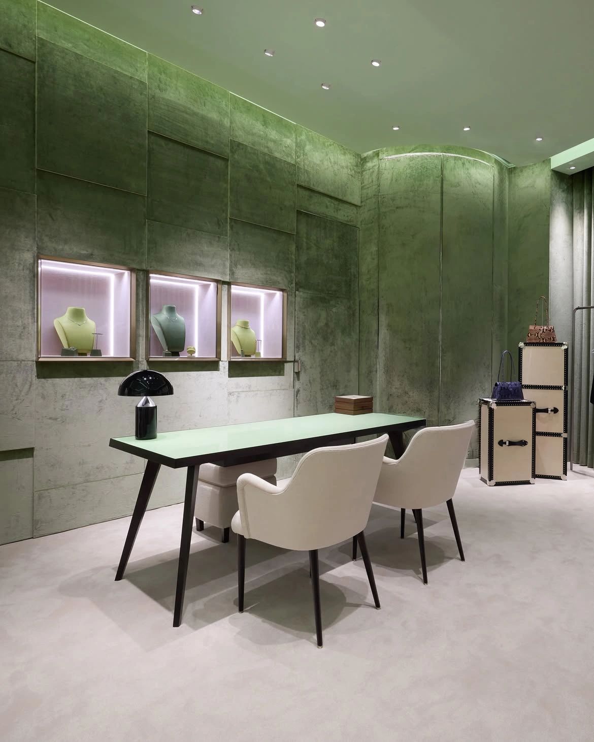 Green-marble consultation area inside Prada's K11 MUSEA boutique