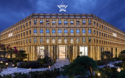 Dior Bamboo Pavilion exterior illuminated at night in Daikanyama, Tokyo