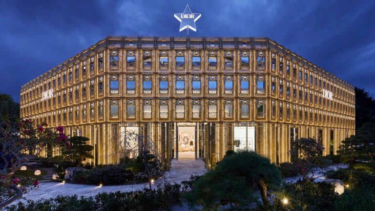 Dior Bamboo Pavilion exterior illuminated at night in Daikanyama, Tokyo