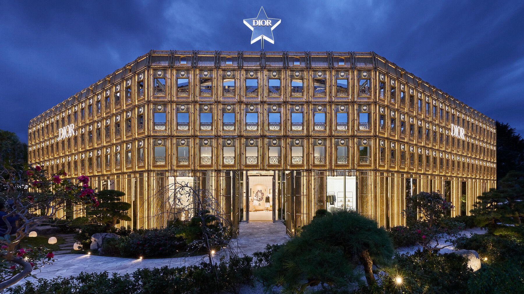 Dior Bamboo Pavilion exterior illuminated at night in Daikanyama, Tokyo