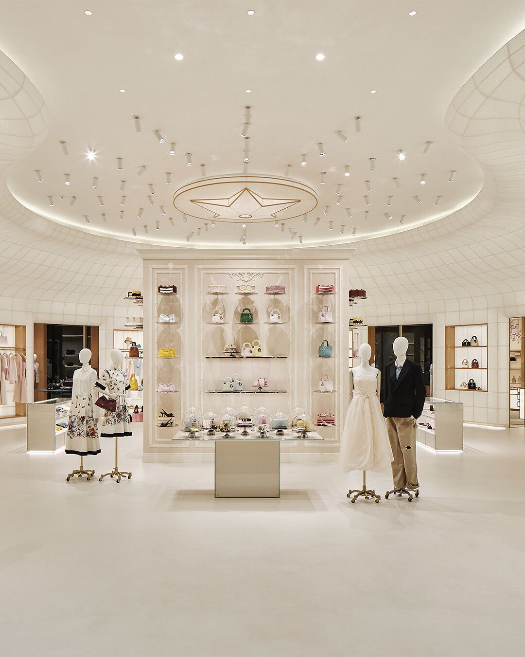 Interior of the Dior Bamboo Pavilion with fashion and handbag displays