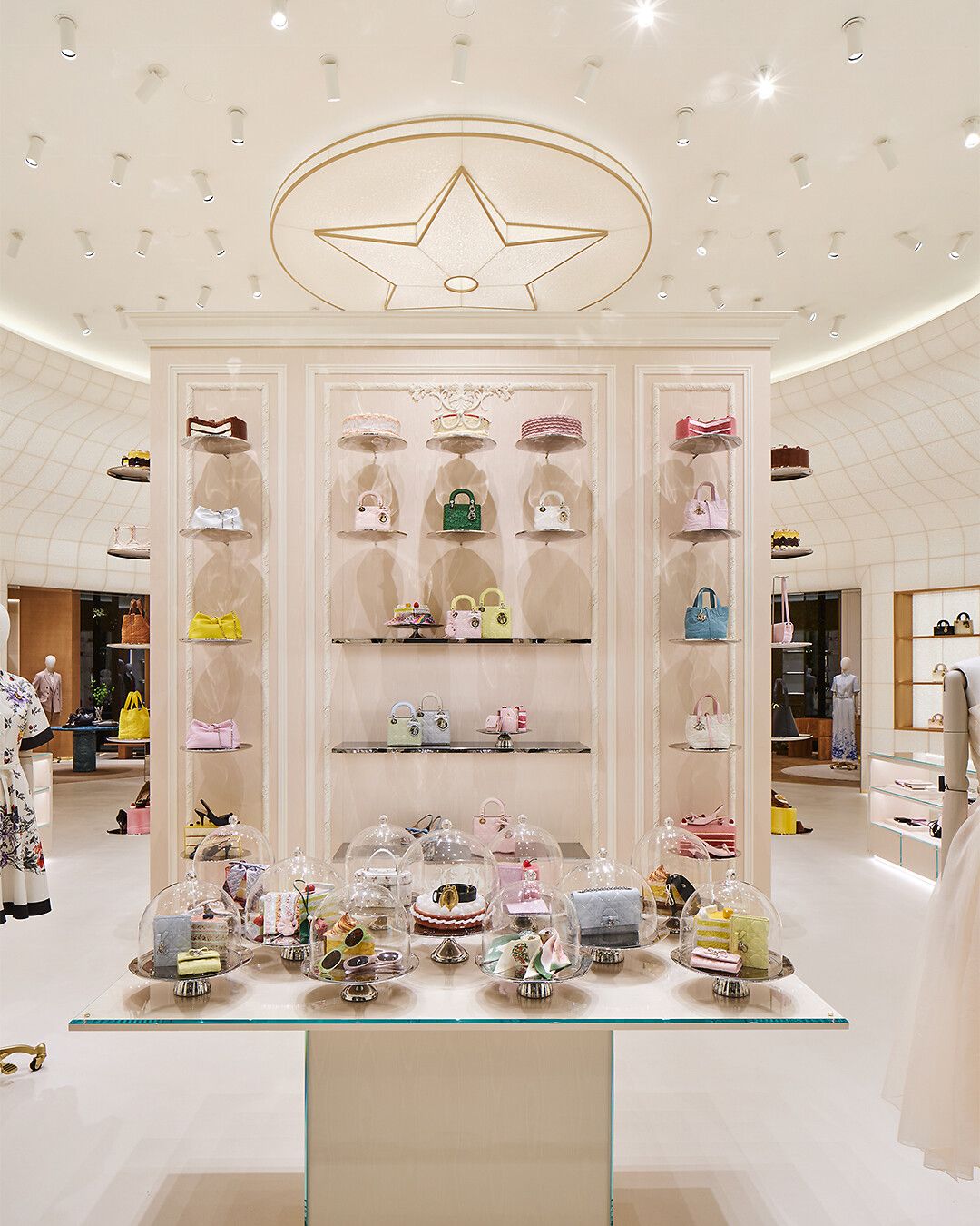 Dior handbag display beneath the star motif inside the Bamboo Pavilion