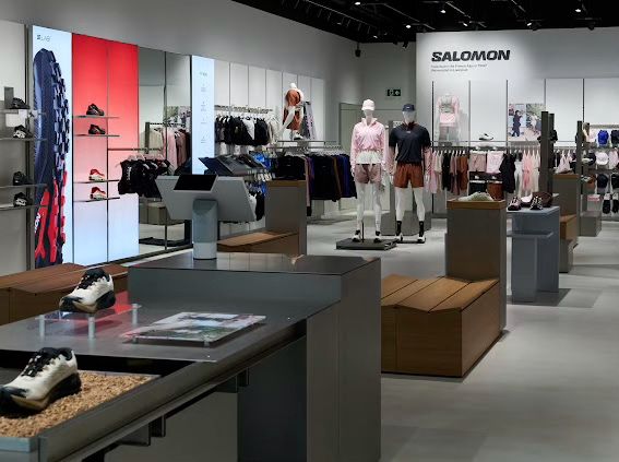 Footwear and apparel displays inside the Salomon Liverpool ONE store