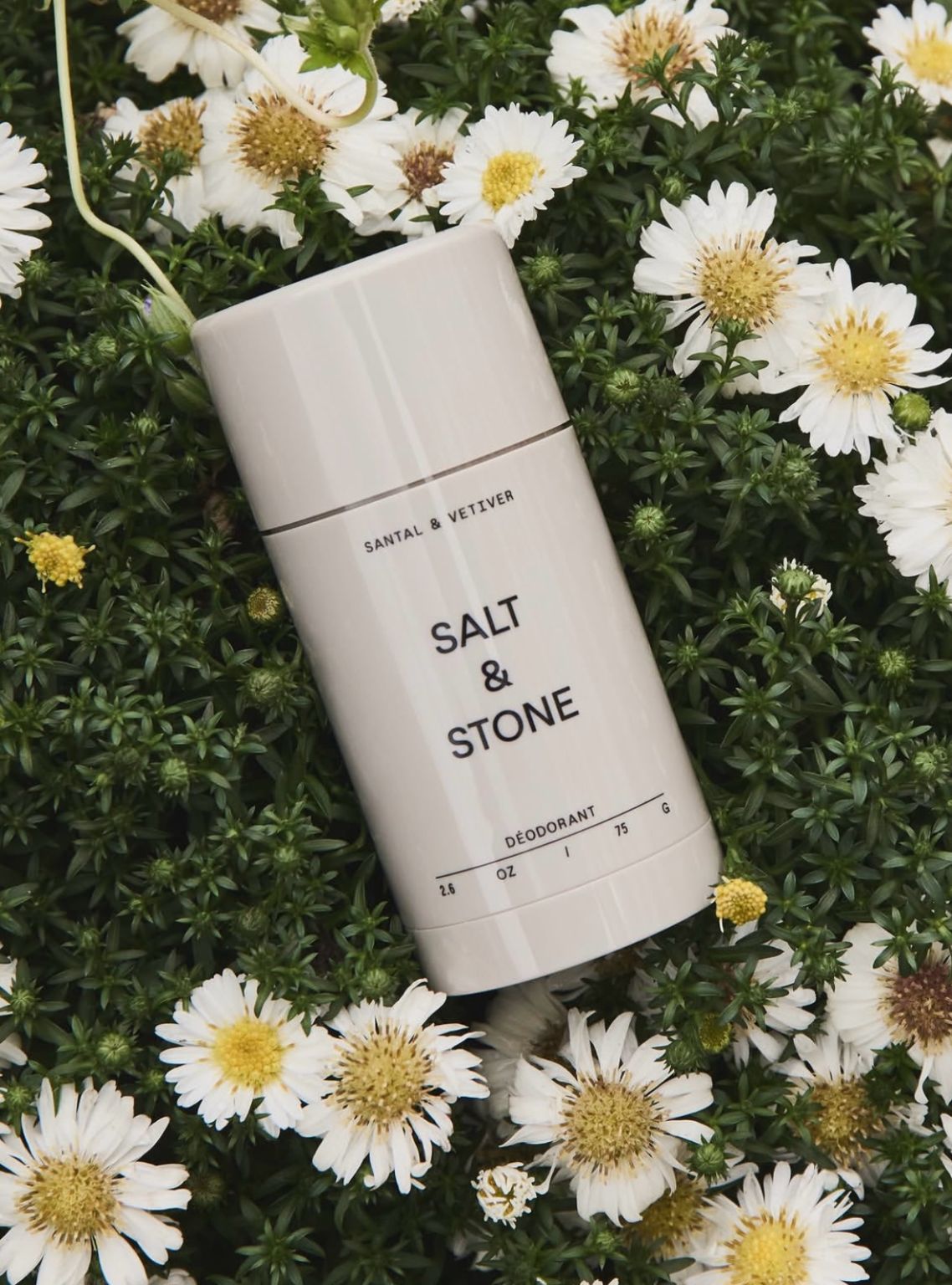 Salt & Stone product photographed among flowers