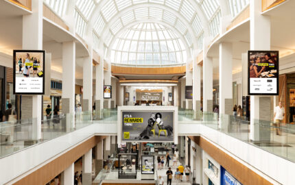 Simon campaign placements inside Roosevelt Field mall.