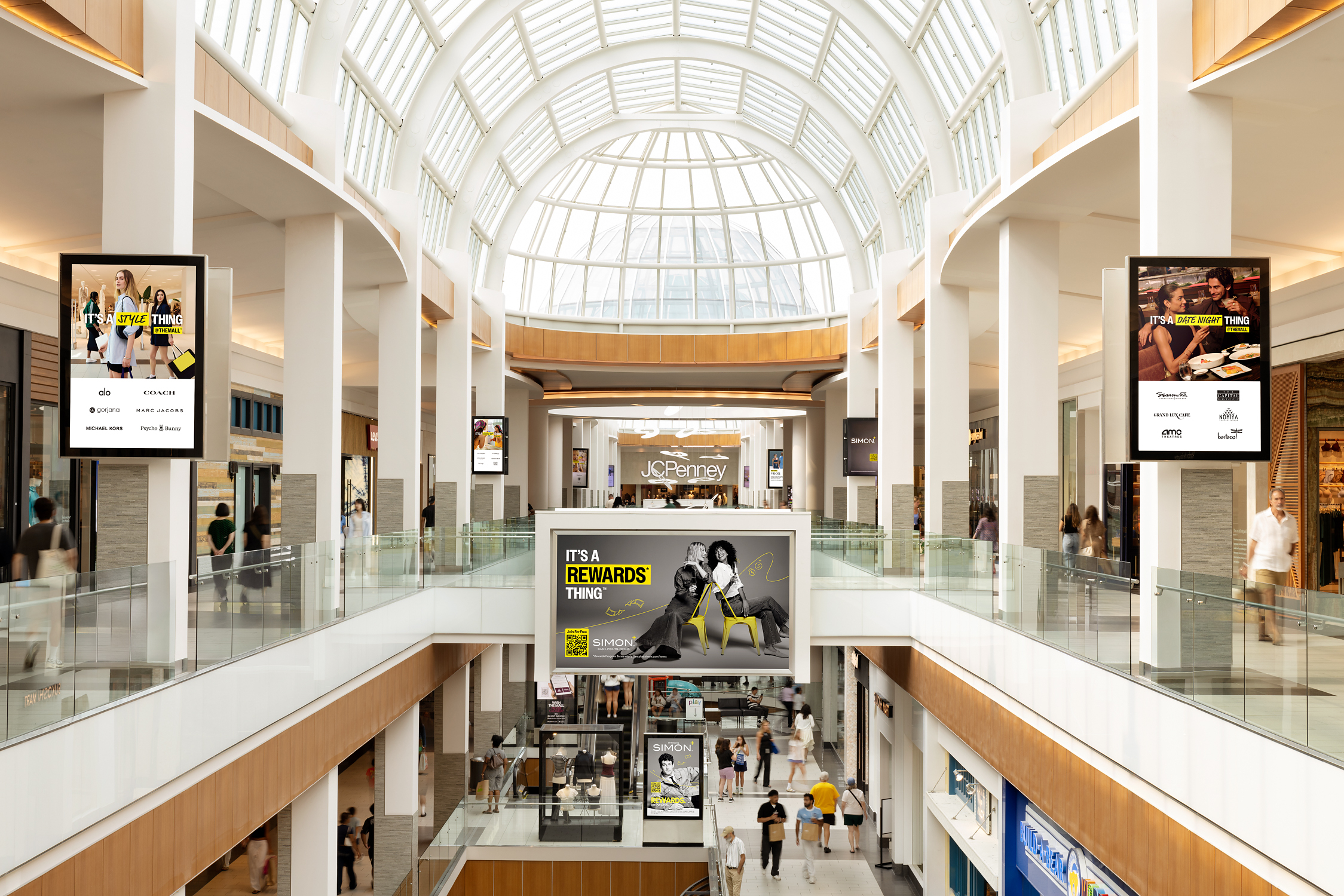 Simon campaign placements inside Roosevelt Field mall.