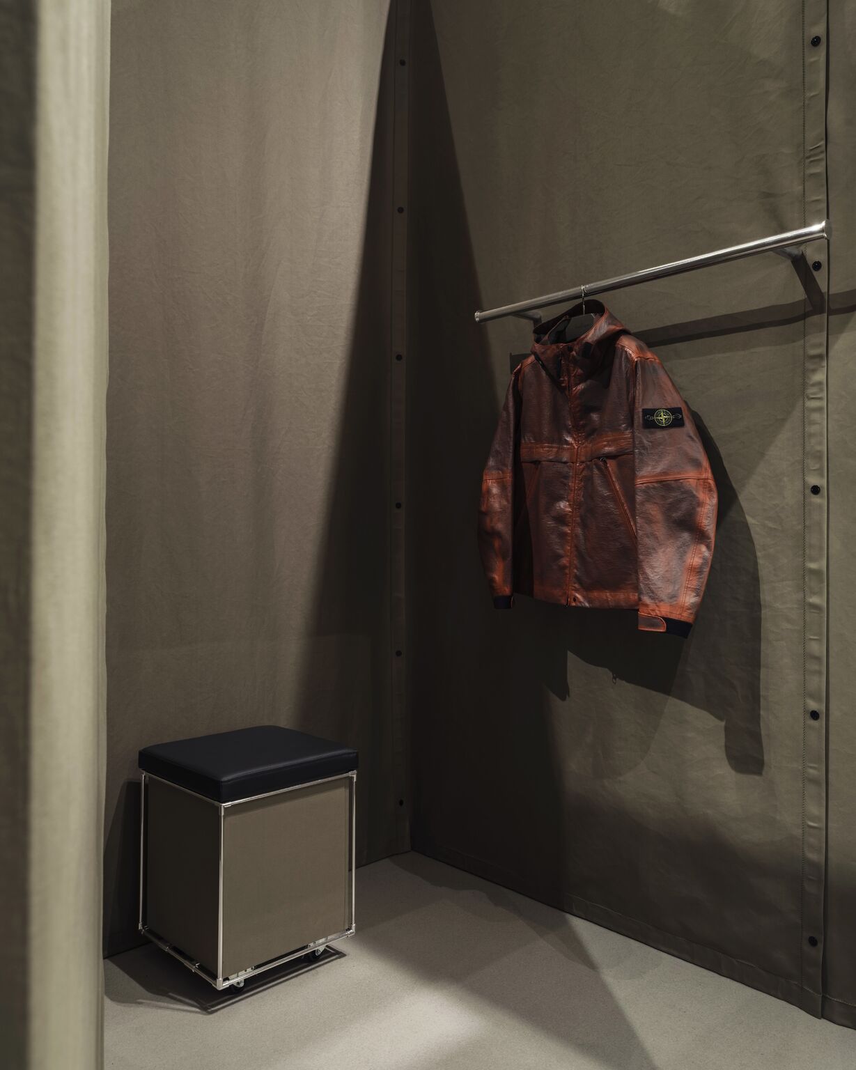 Stone Island garments and installation details at The Corner Shop