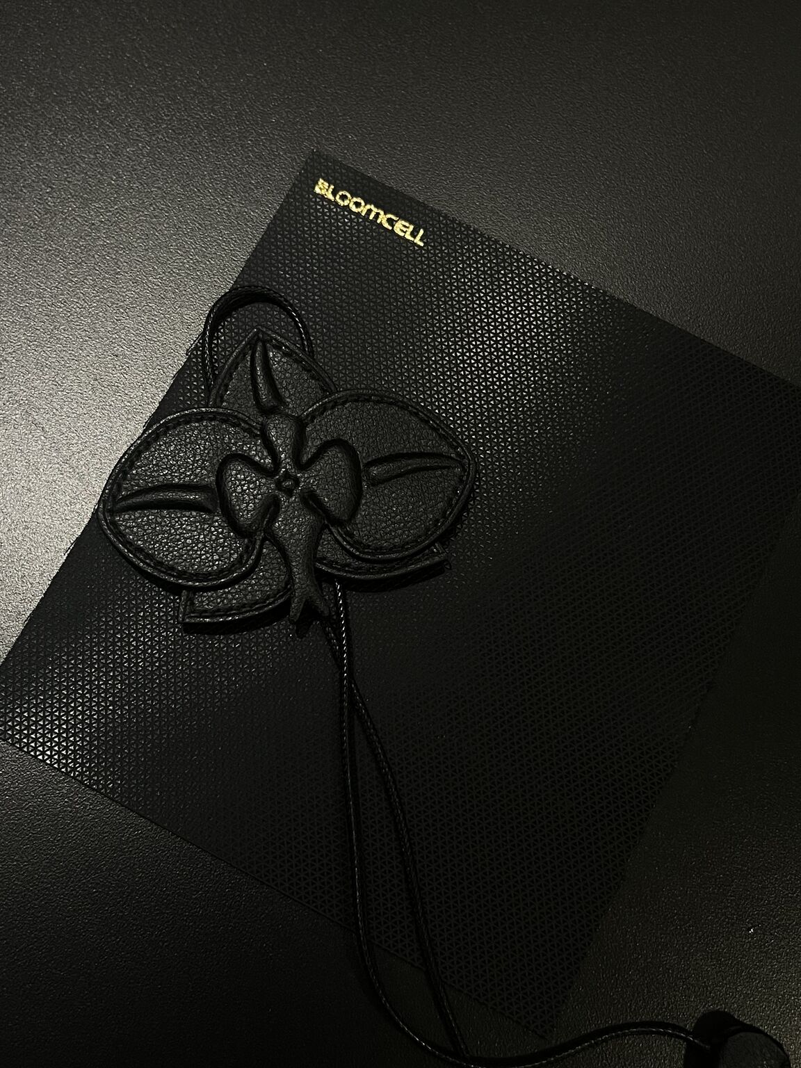 BloomCell sample with an embossed floral design