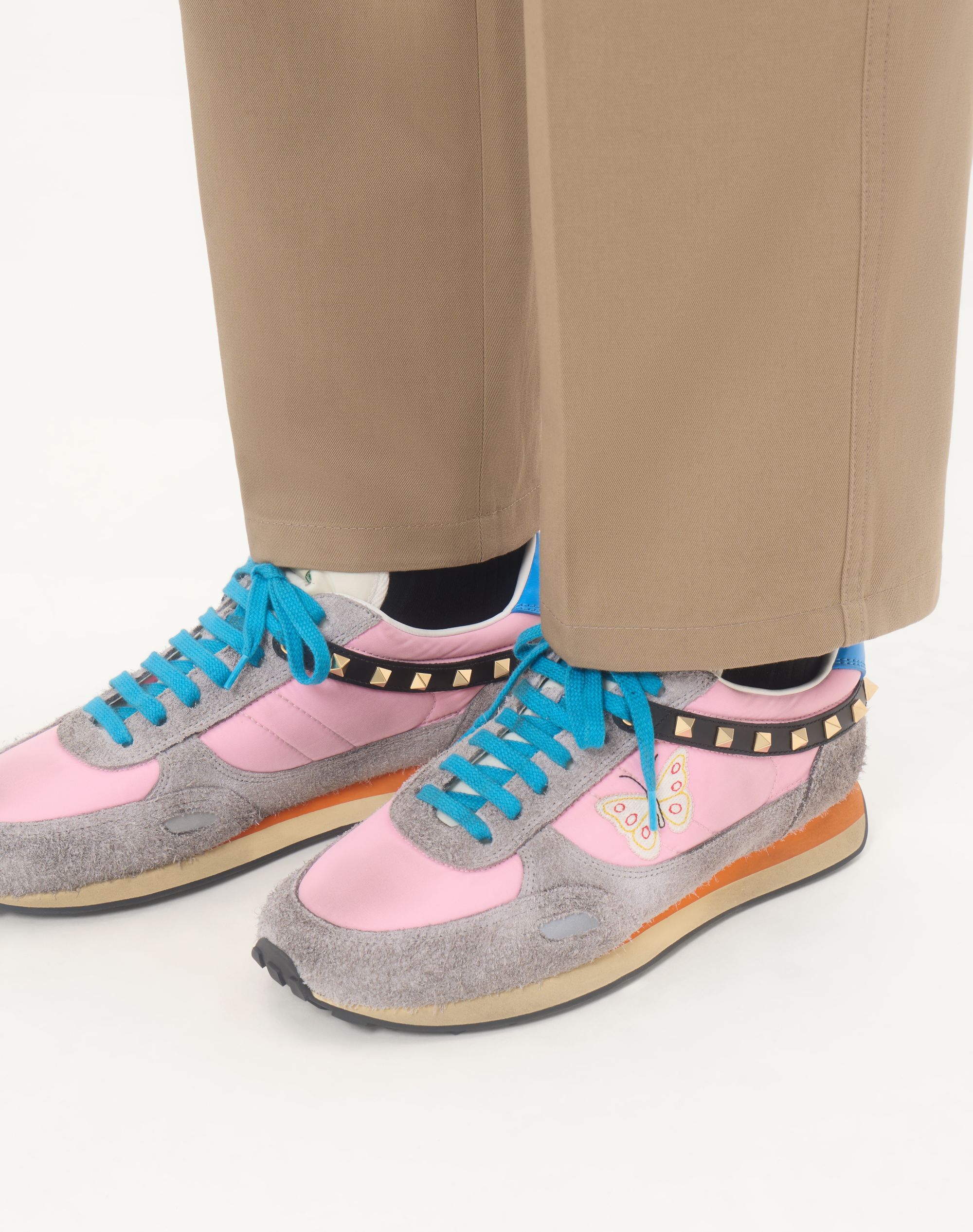 Valentino Garavani Stud Up sneaker in pink with butterfly embroidery