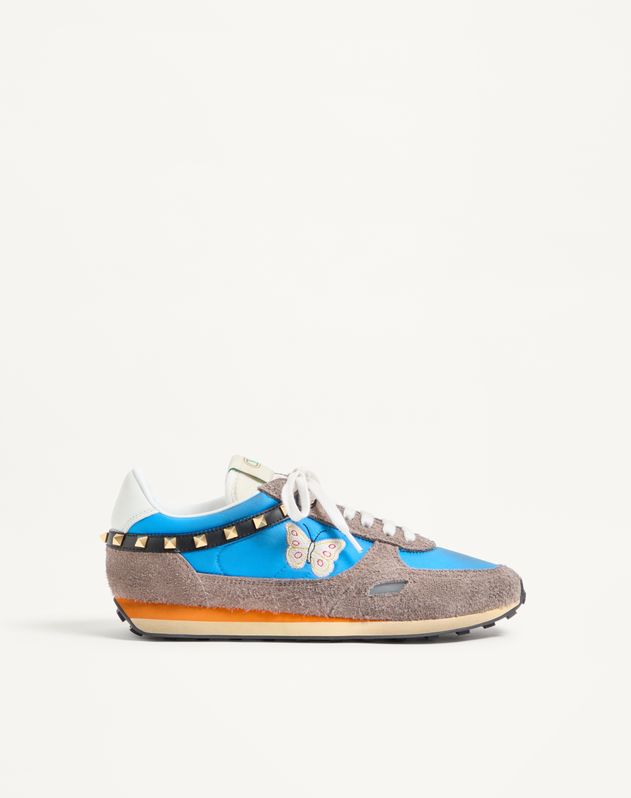 Valentino Garavani Stud Up sneaker in azure with butterfly embroidery