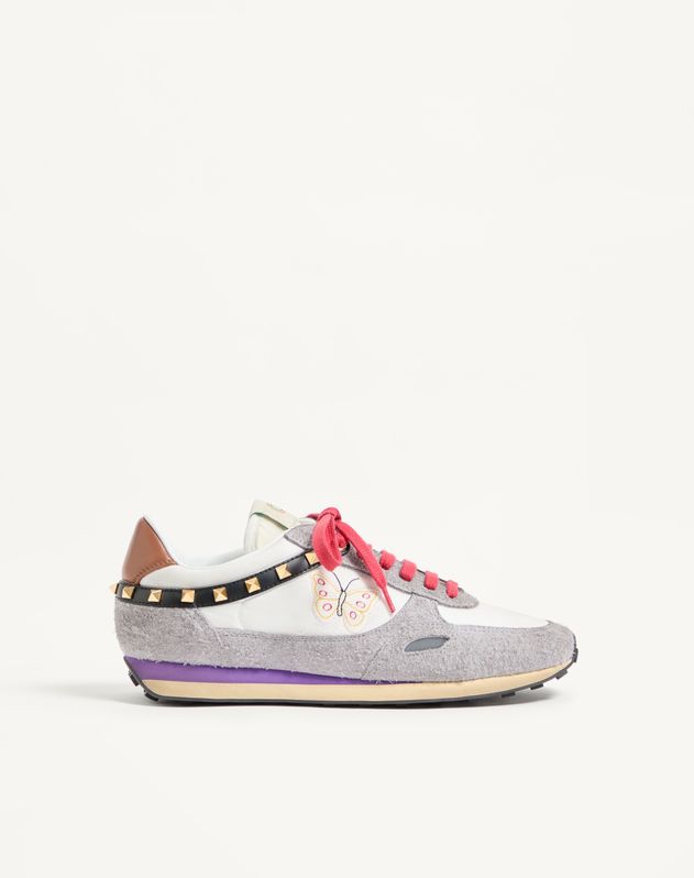 Valentino Garavani Stud Up sneaker in white with multicolor butterfly embroidery