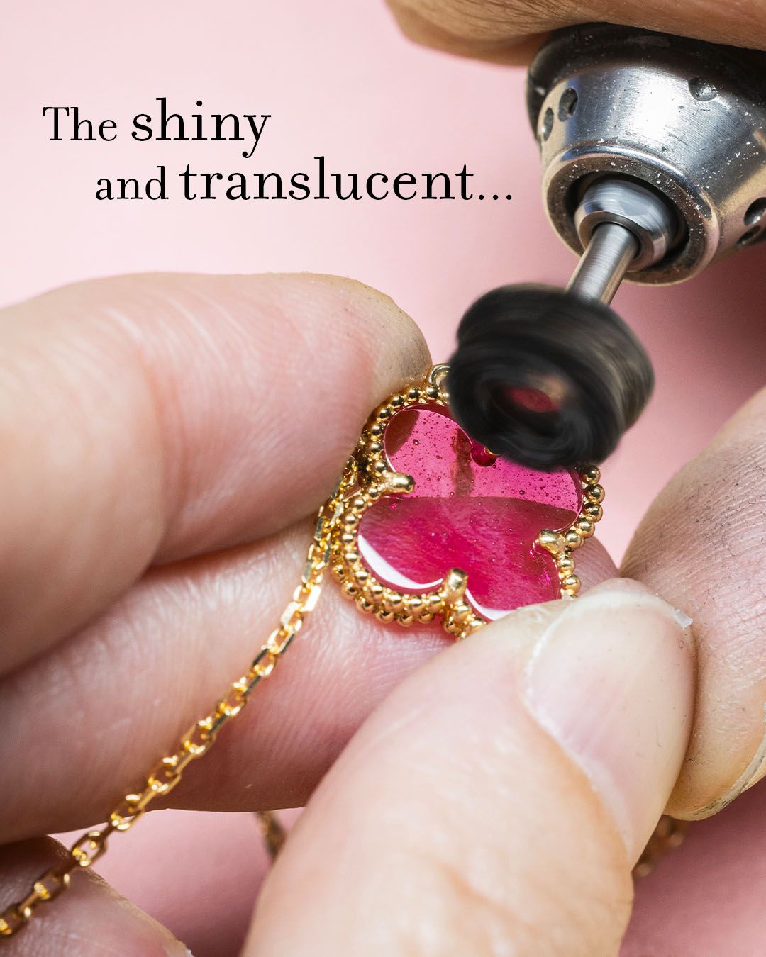 Craftsperson polishing a pink-enamel Van Cleef & Arpels Alhambra pendant