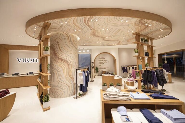 Interior of Vuori's Beijing Indigo store with mosaic ceiling and central display