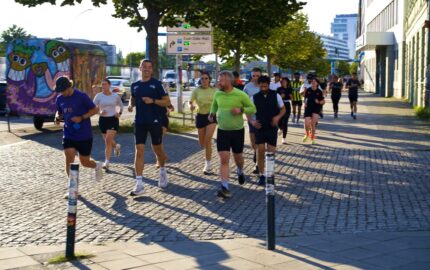 Runners on a Berlin street in Zalando's marathon campaign video cover