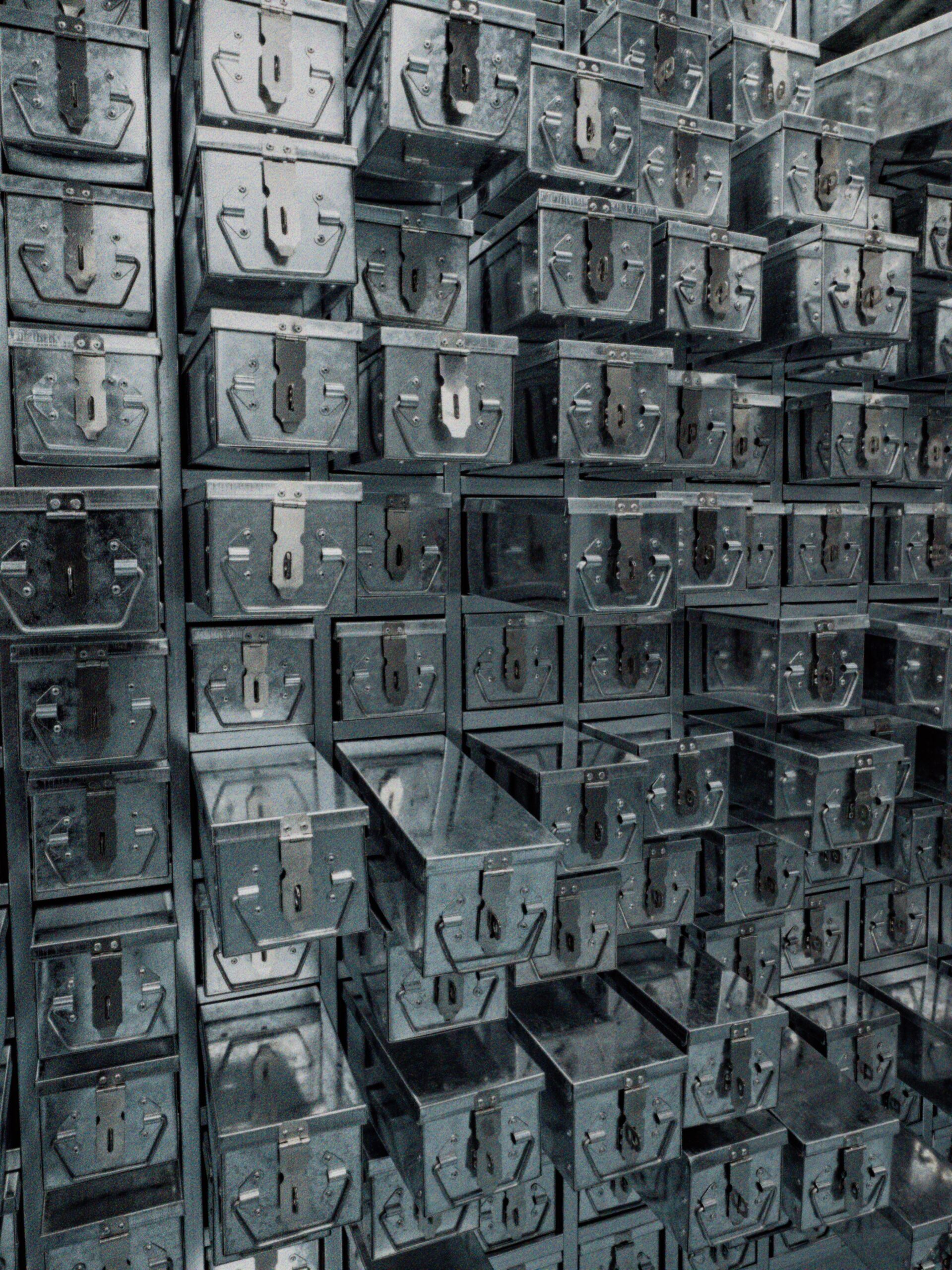 Open and closed reclaimed vault drawers forming the 12_things store wall