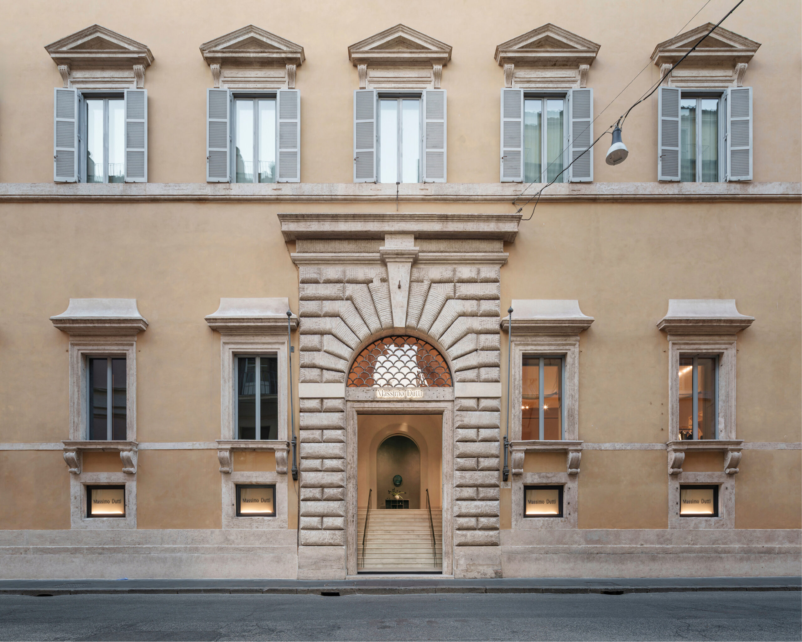 Front facade and entrance of the Massimo Dutti Rome flagship at Palazzo Ruspoli