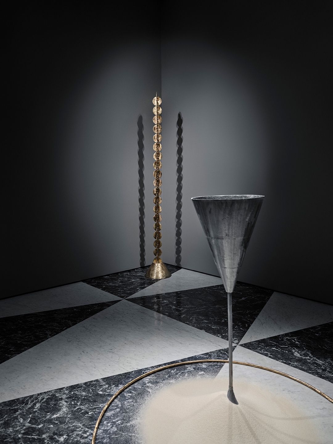 Sculptural column and tapered vessel in A Measure of the Moon