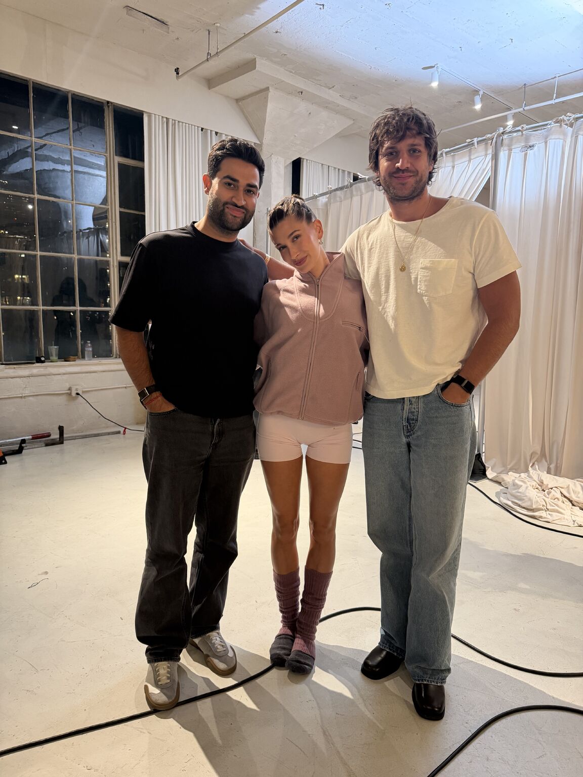 Behind-the-scenes group photograph from the Adanola collaboration
