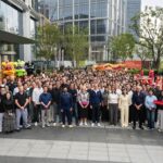 adidas teams gathered outside an office building in China