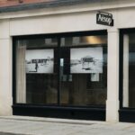 Michael Cook photographs displayed across Aesop Marylebone’s street-facing windows