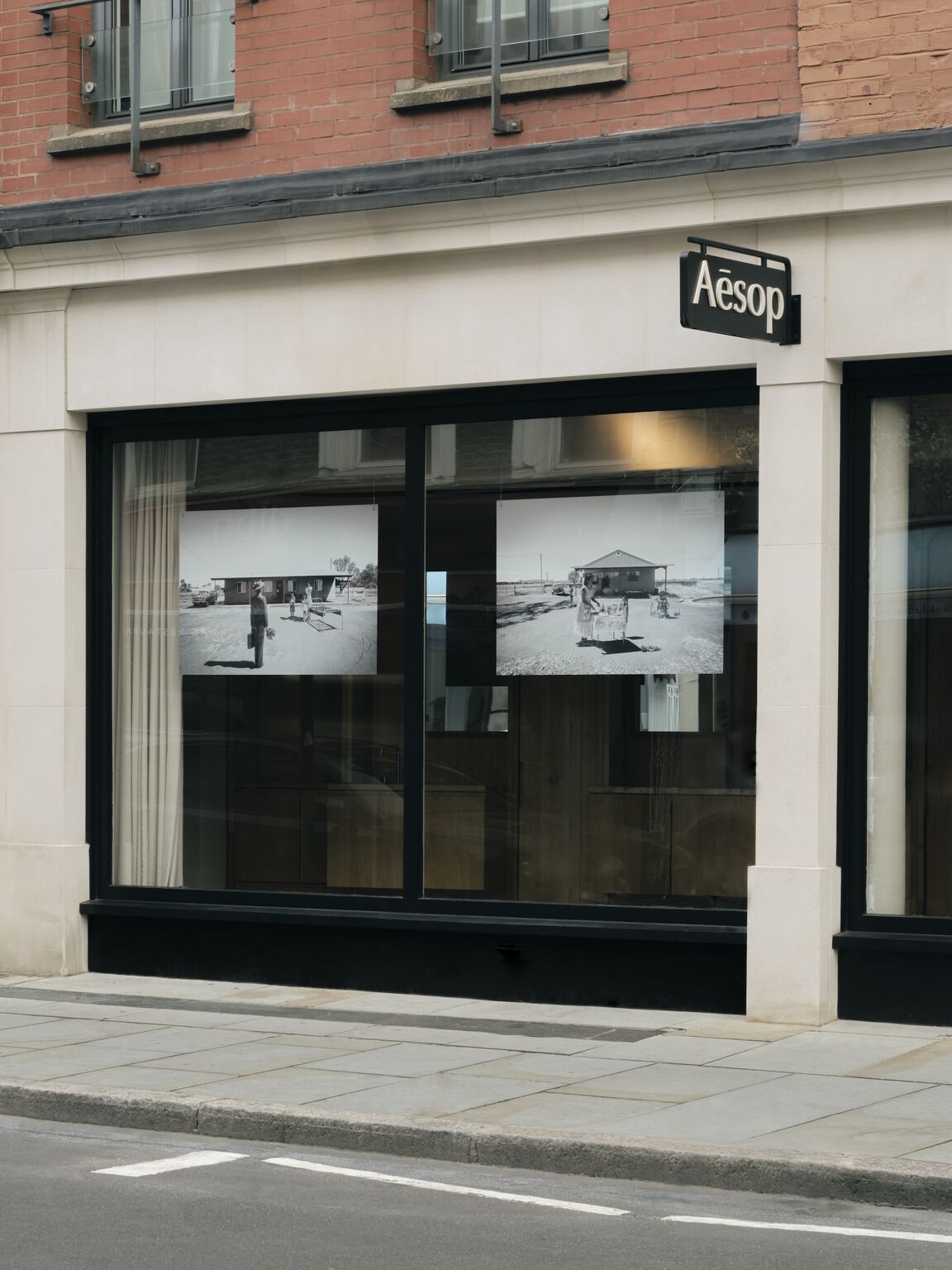 Michael Cook photographs displayed across Aesop Marylebone’s street-facing windows