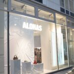 Illuminated ALOHAS storefront at Brandstätte 8 in Vienna