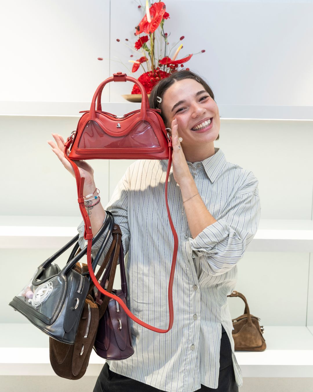 Guest holding handbags at the Vienna opening