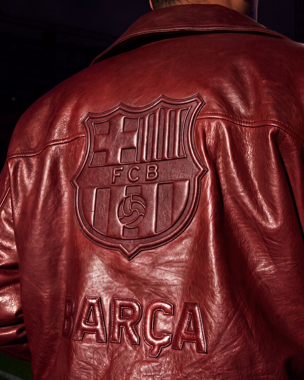 Embossed FC Barcelona crest on burgundy AMIRI jacket