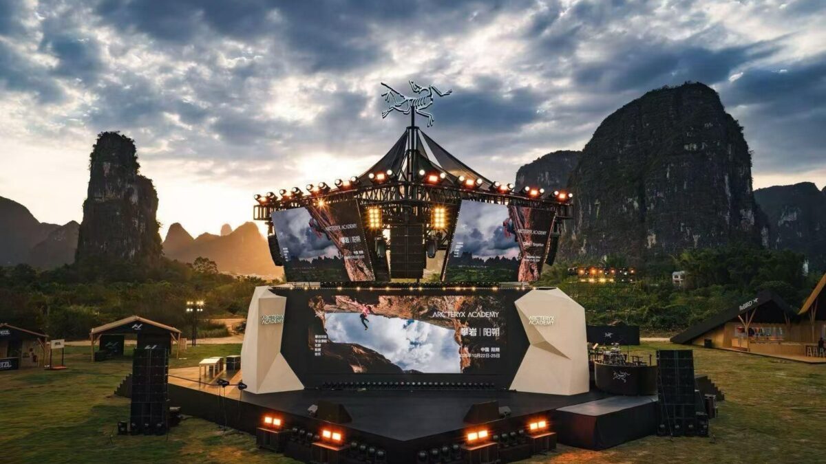 Arc’teryx Climbing Academy stage and screens against Yangshuo’s limestone hills