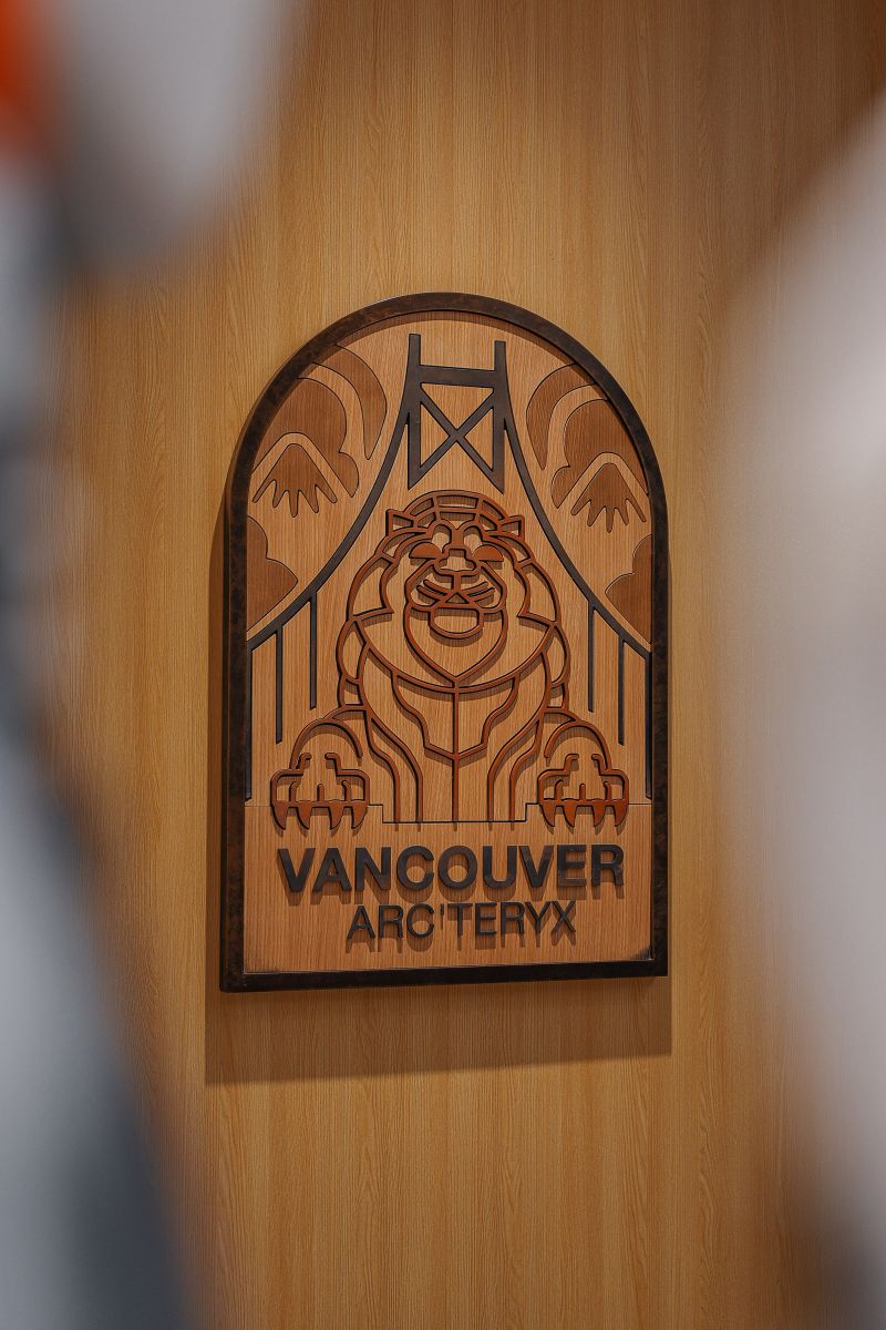 Arc’teryx Vancouver emblem on a wooden panel