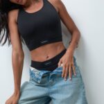 Reign Studio black wireless bralette styled with jeans