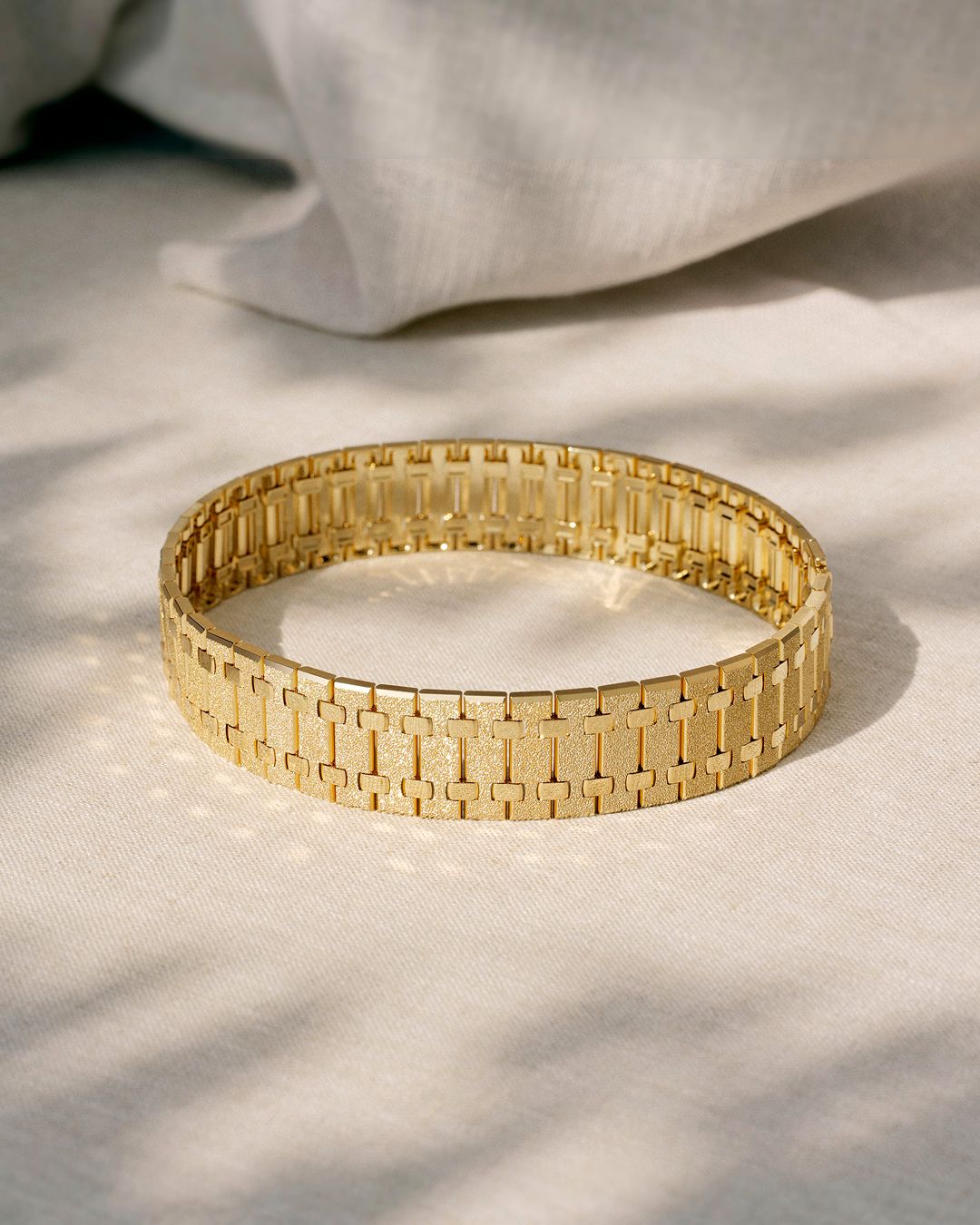 Gold Royal Oak Joaillerie piece displayed on fabric