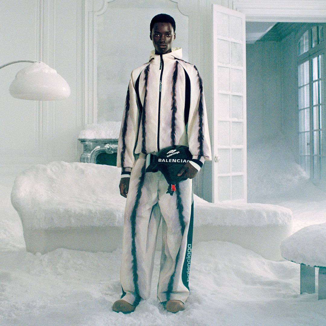 Model wearing striped Balenciaga winter separates