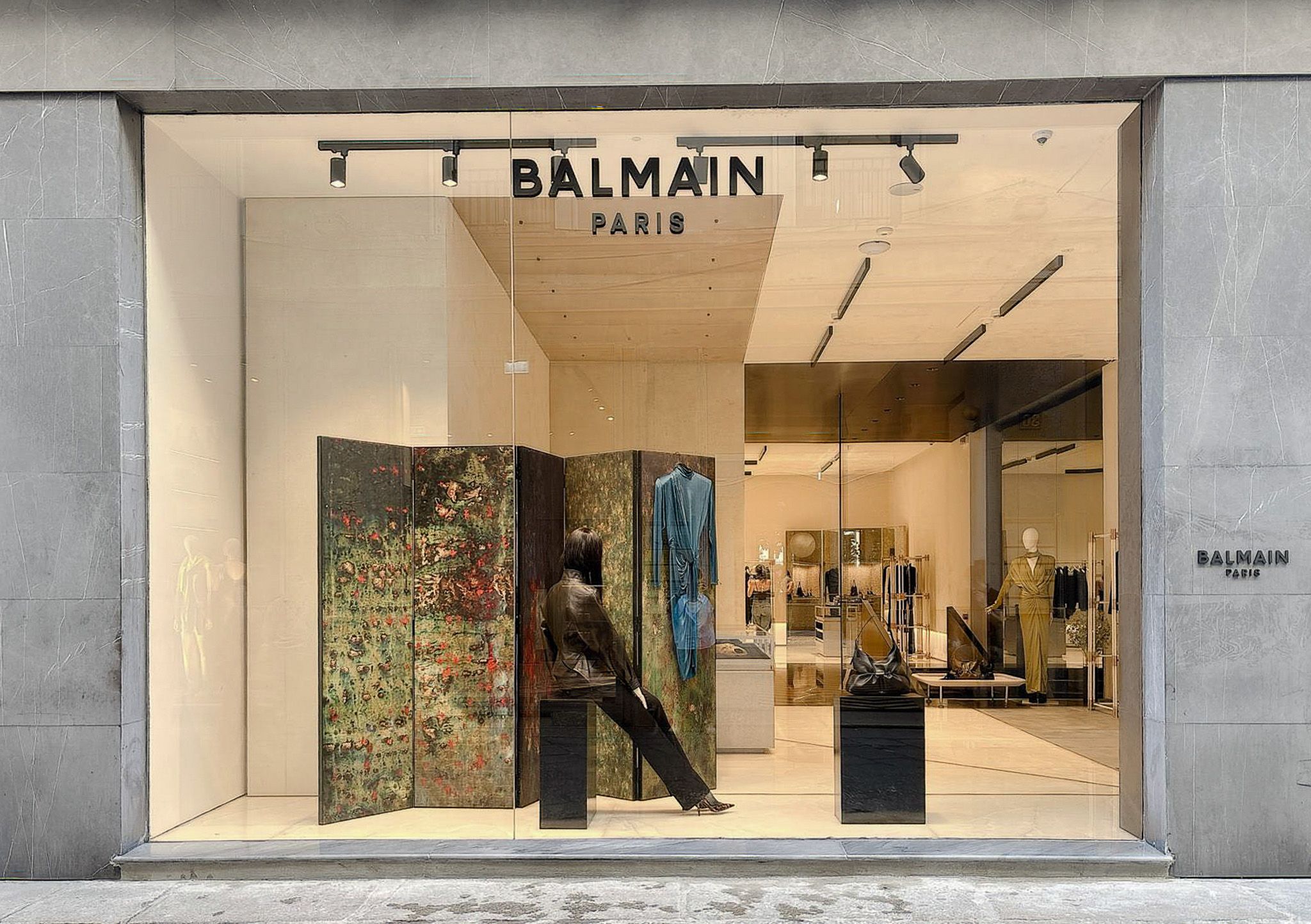 Balmain storefront and window display at Via della Spiga 23 in Milan