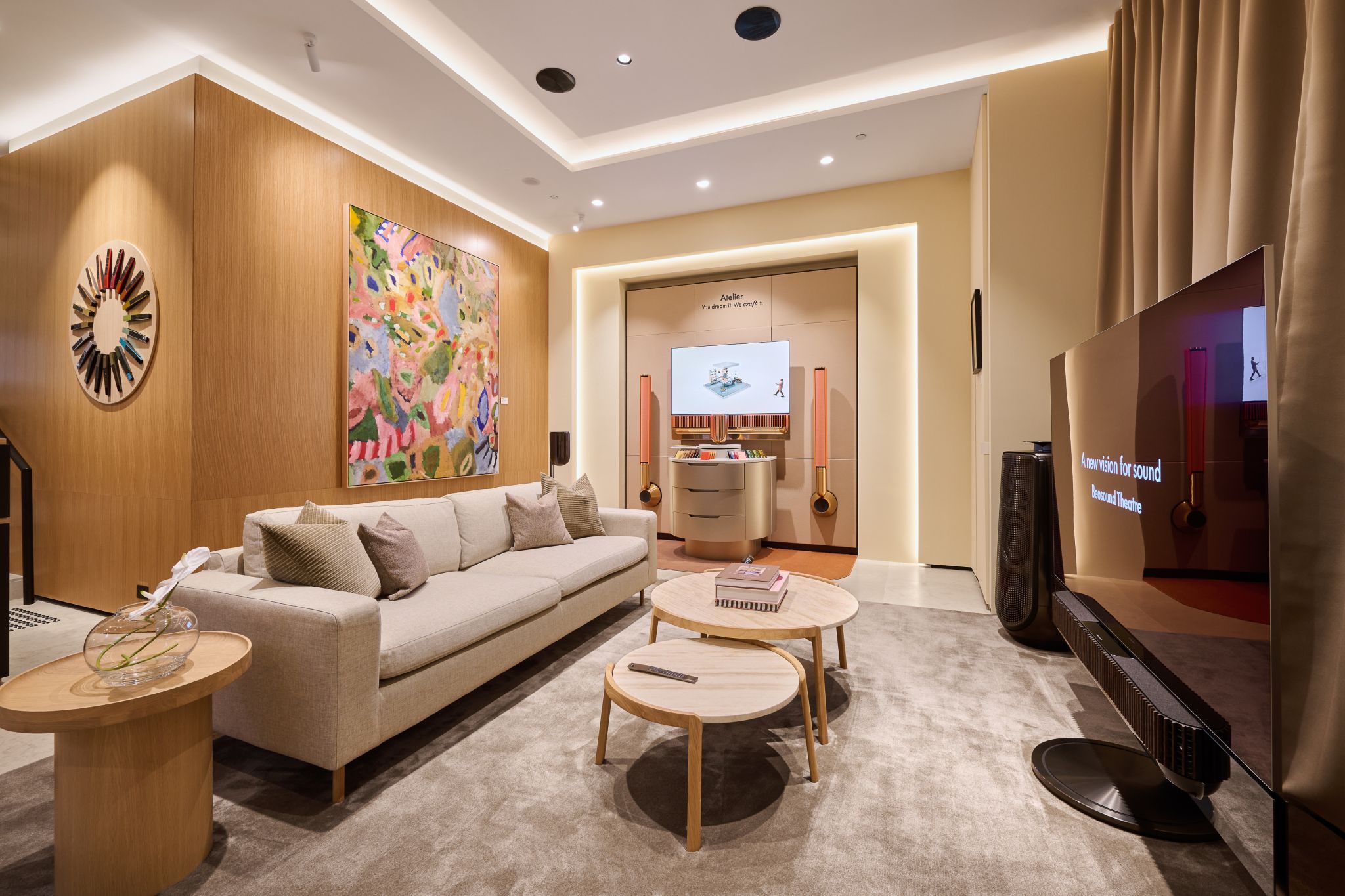 Sofa, coffee tables and audio displays in a furnished room