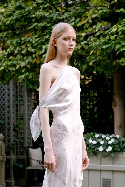 Model in a pale dress at L’AGENCE’s Paris presentation