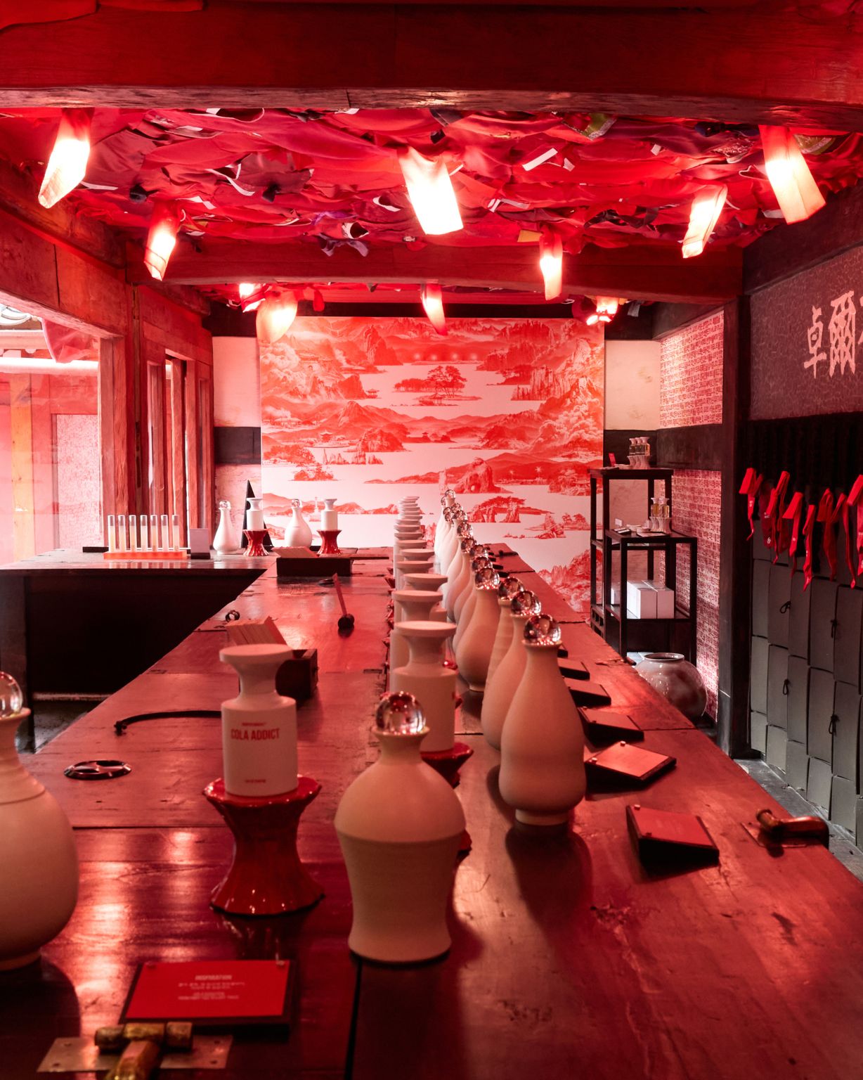Red interior with fragrance testing displays at Bukchon