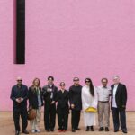 Guests gathered against a pink architectural wall for the Barragán Prize celebration