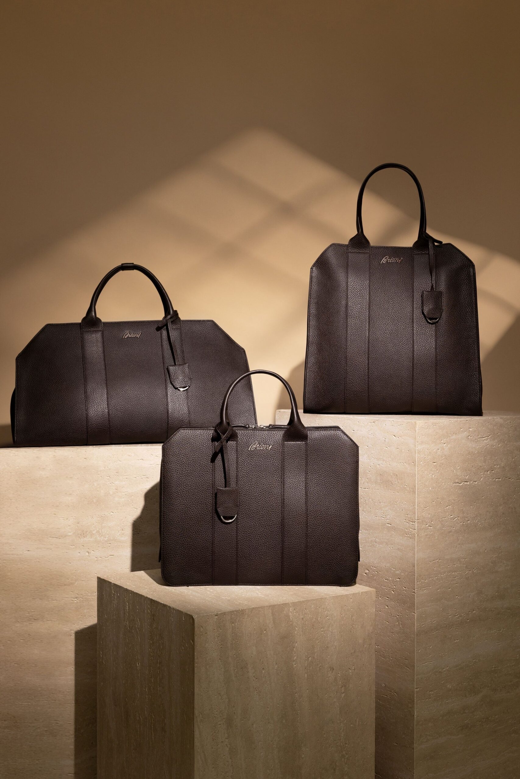 Brioni Barberini briefcase, tote and duffel in the launch campaign