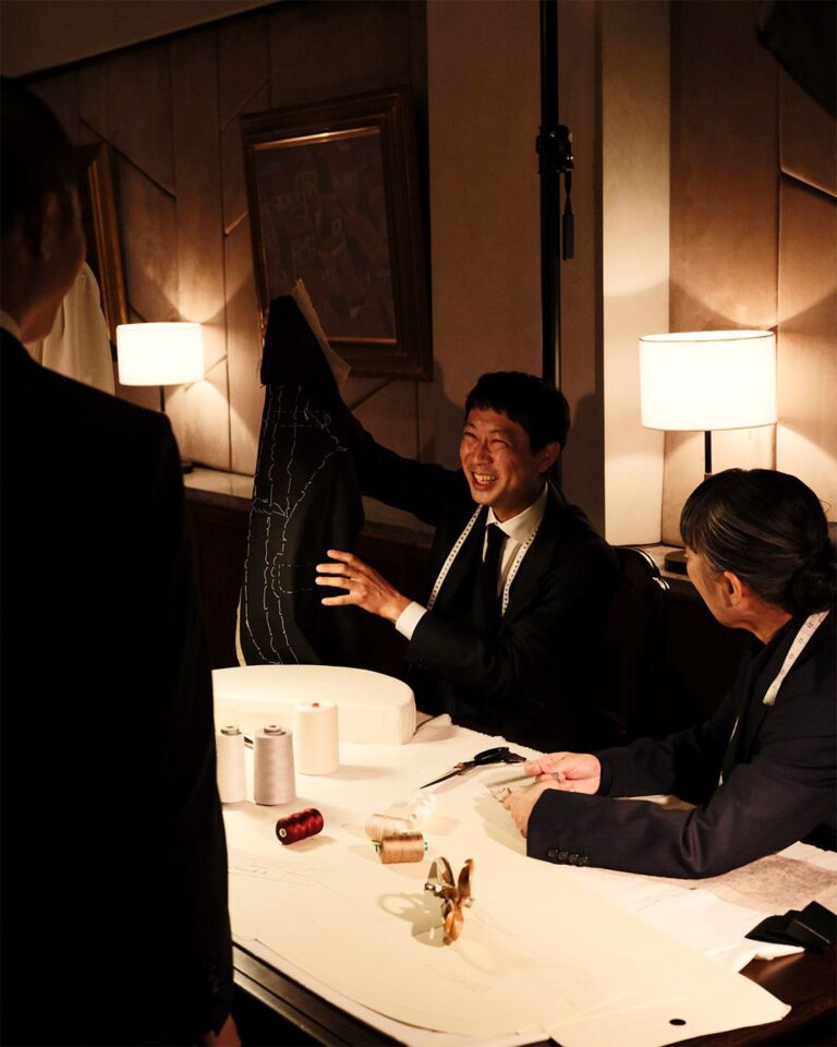 Brioni tailor demonstrates a jacket during the Tokyo Grand Tour presentation