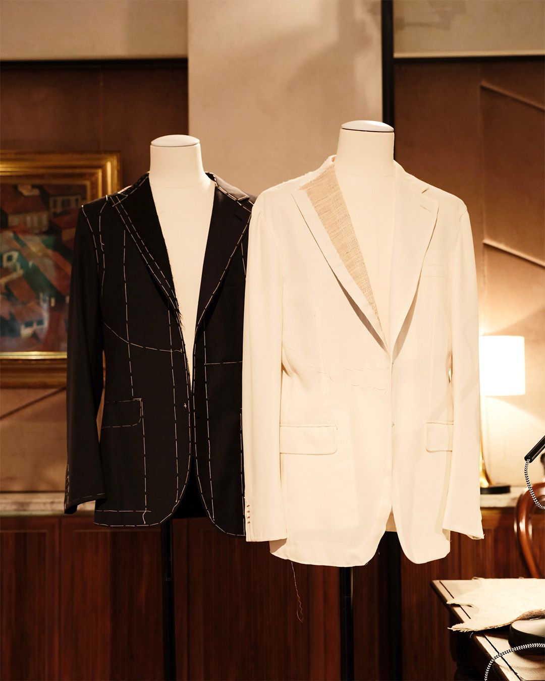 Two Brioni jackets on dress forms at the Grand Tour