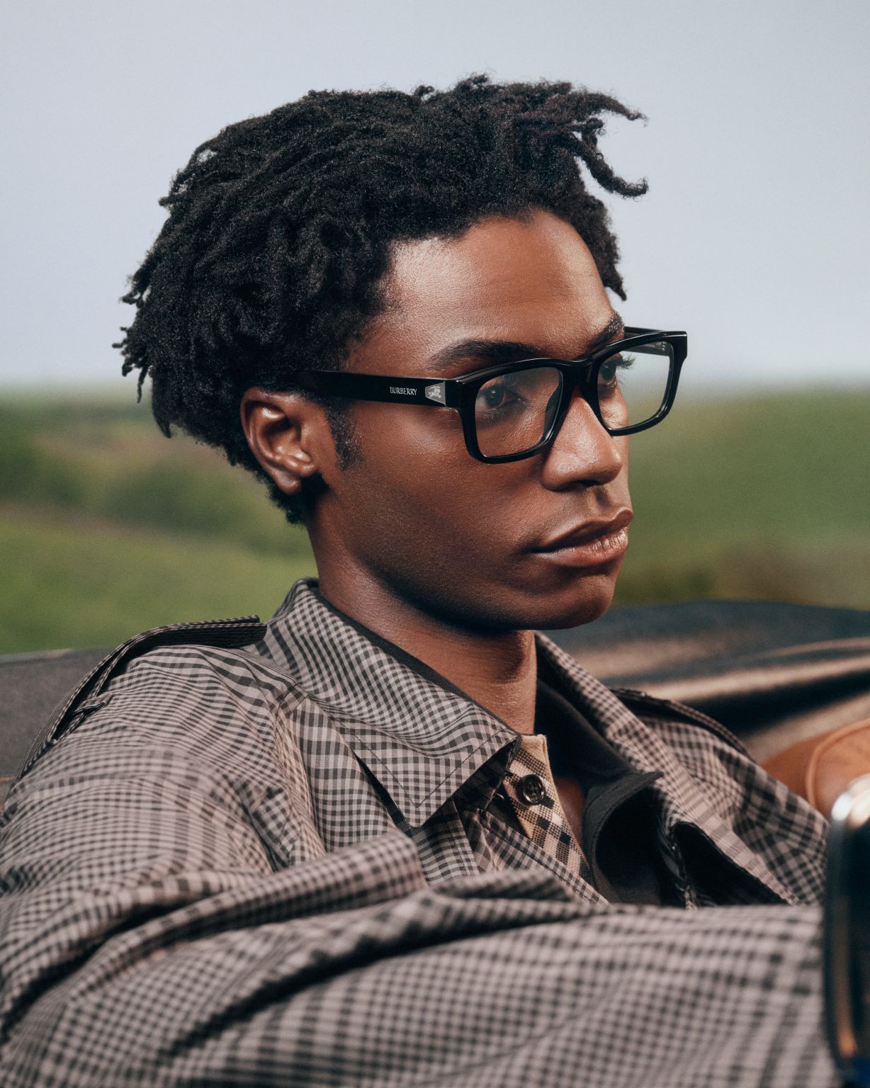 Ahmed Richards wearing black Burberry optical frames in the Autumn Winter 2026 eyewear campaign