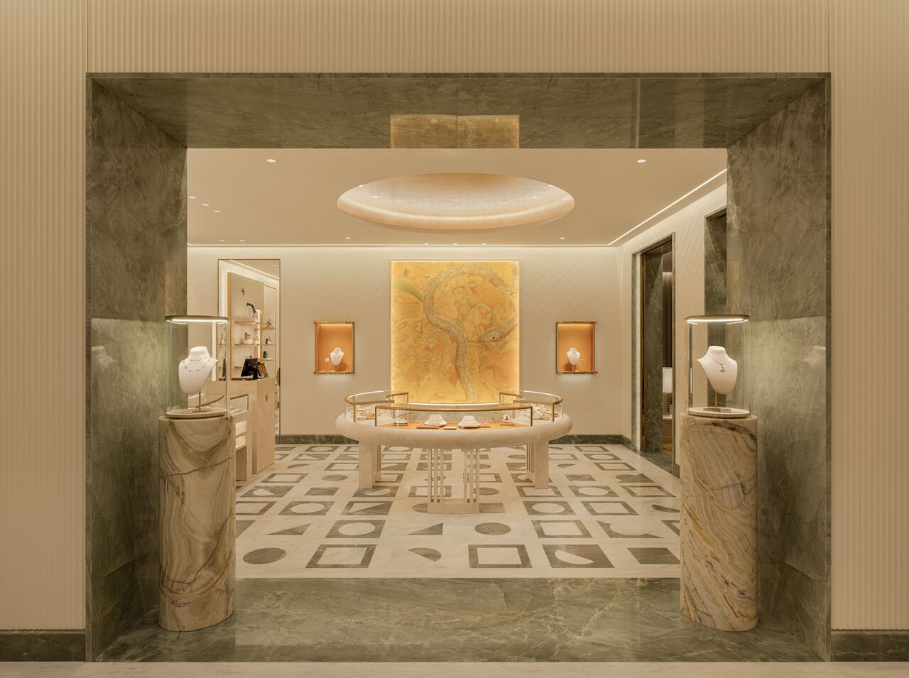 Stone-framed entrance and interior of Bvlgari Haikou