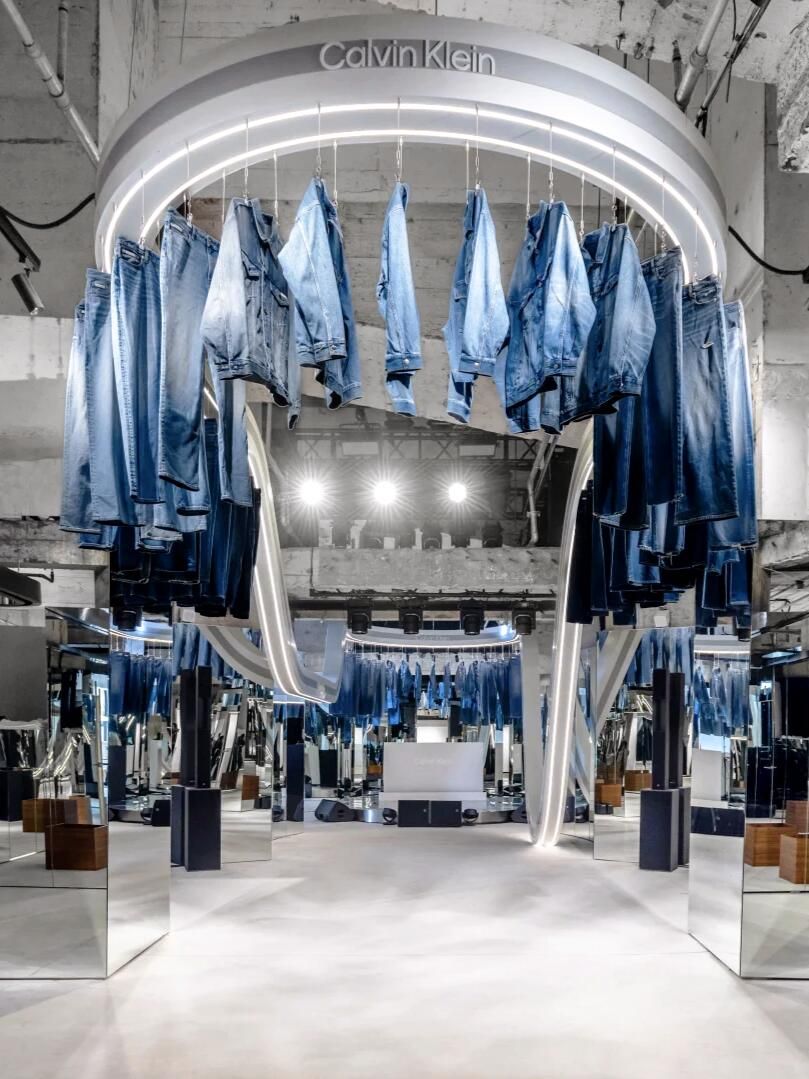 Denim garments suspended above the House of Denim installation
