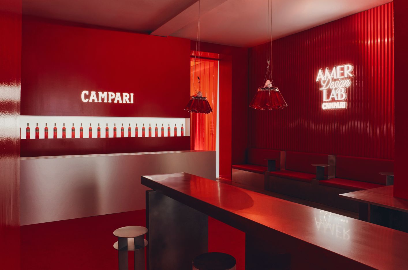 Red Campari Amer Design Lab interior and illuminated event signage in Paris