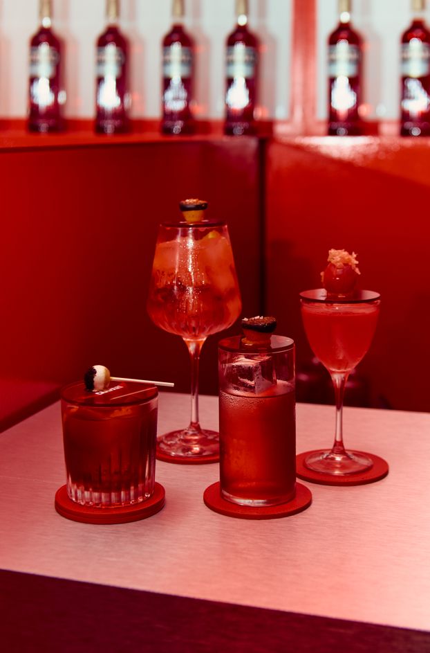 Four cocktail creations displayed in the Amer Design Lab