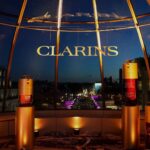 Clarins Double Serum display overlooking Paris at the brand's Fashion Week dinner